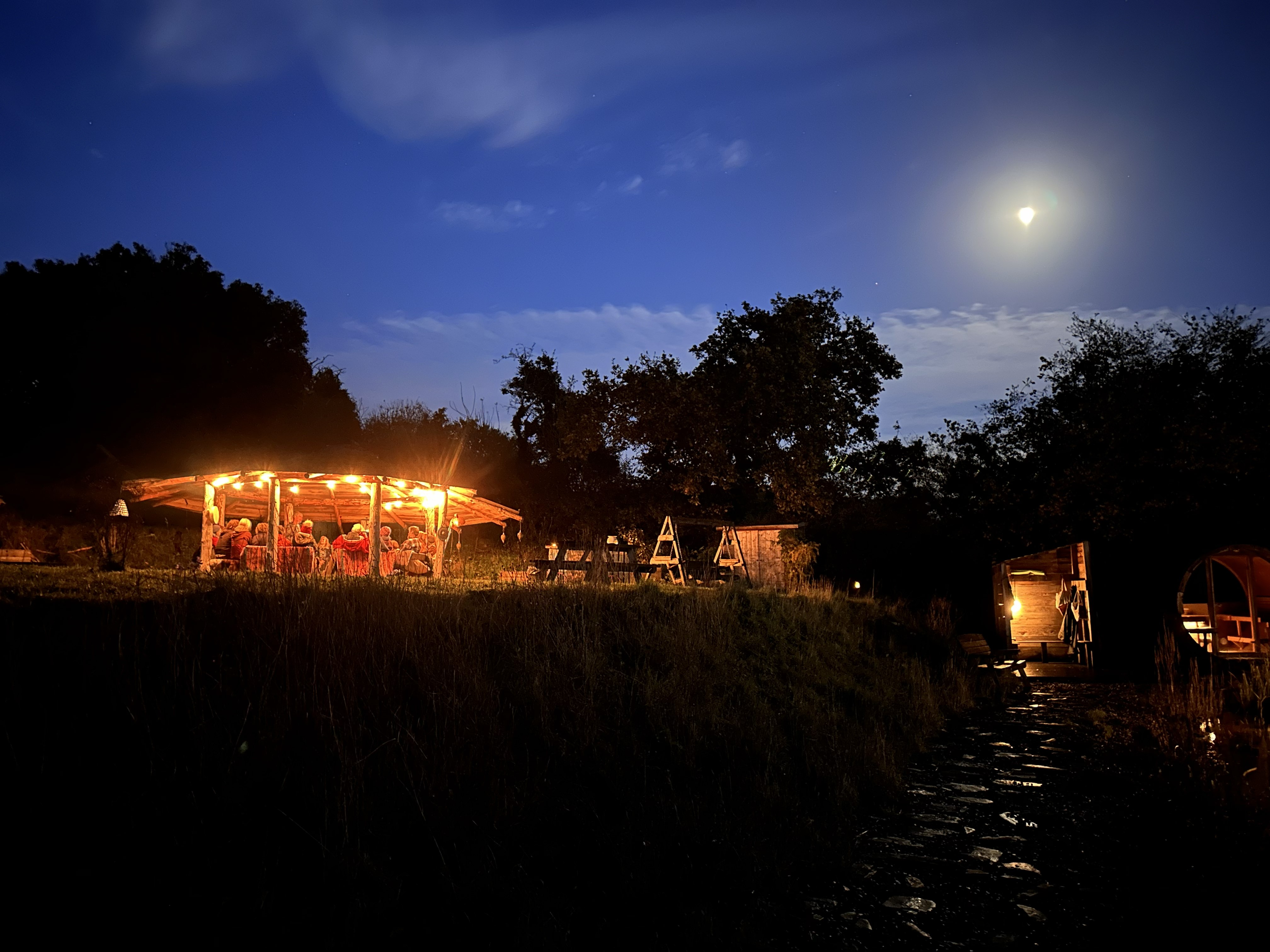 Evening gathering at the Field of Possibility